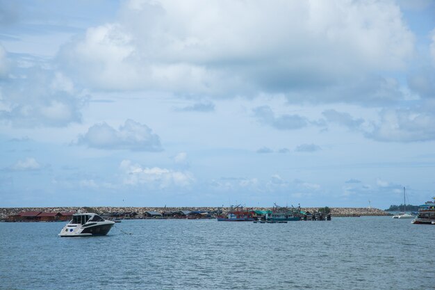 Boat moored ships at sea