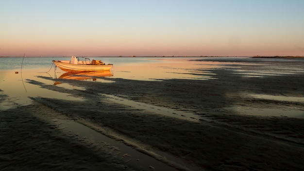 boat moored on shore