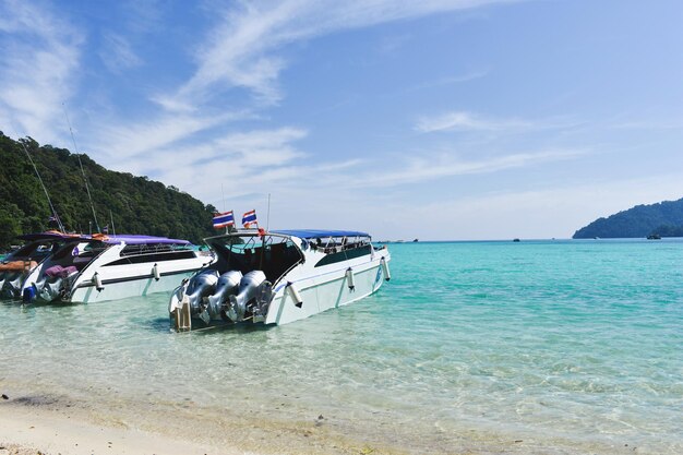 Boat parked on the sea and blue sky at surin thailand