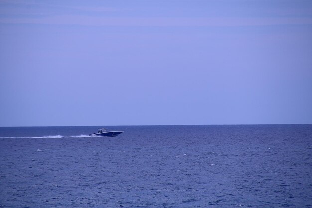 Boat sailing in sea