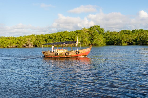 Boat sailing on the una river in the late afternoon