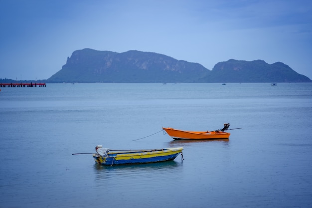 Boat on sea and hill