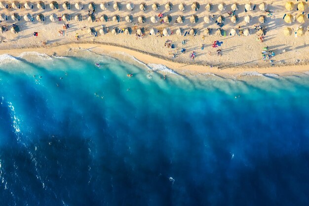 Boat on the water surface from top view Azure water background from top view Summer seascape