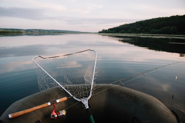 Photo boat with fishing net landscape