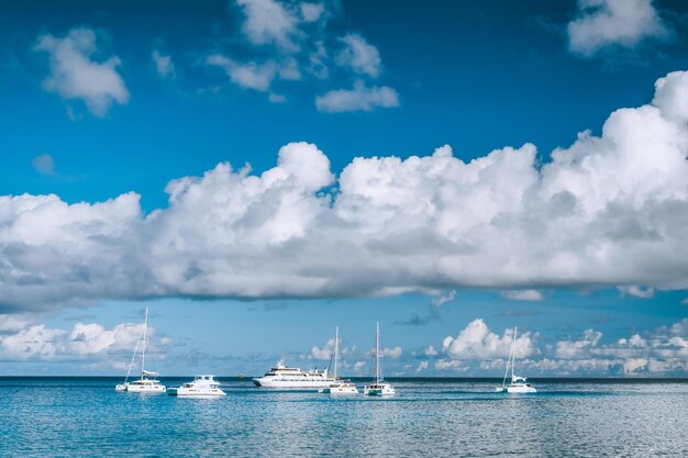 Boats anchored in port of La Digue island Seychelles