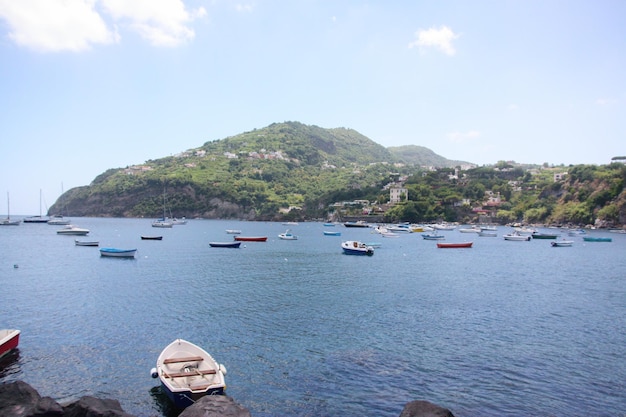 boats in Aragonese Castle Castello bay Ischia Italy