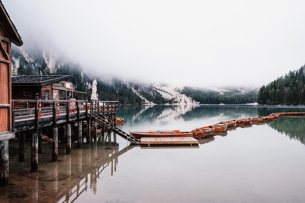 Boats on the Braies Lake Pragser Wildsee in Dolomites mountains Sudtirol Italy dolomite