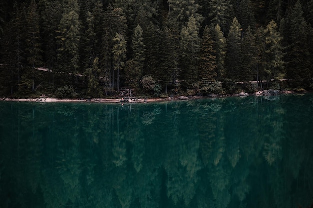 Boats on the Braies Lake Pragser Wildsee in Dolomites mountains Sudtirol Italy dolomite