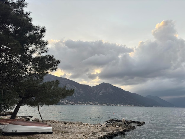 Boats fishing old man and the sea silver sunset Montenegro Kindness Mountains Sea Walk Adventure