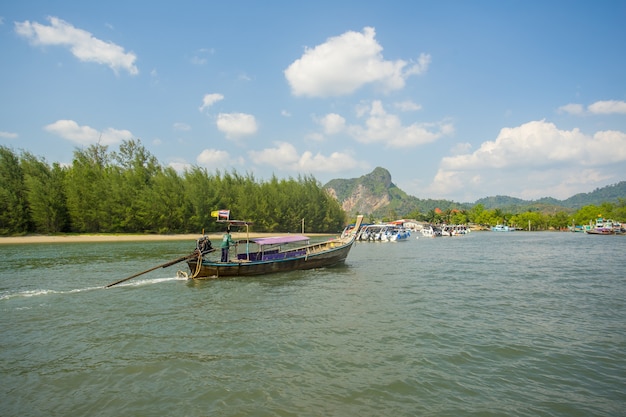 Boats and longtail boats moving to the Nopparat Thara port in Krabi Province Thailand