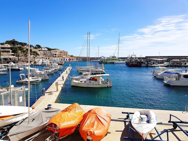 Boats moored at harbor