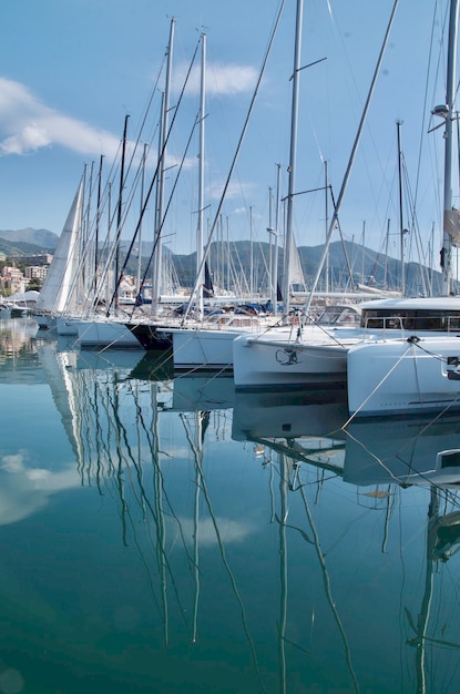 Boats moored at harbor