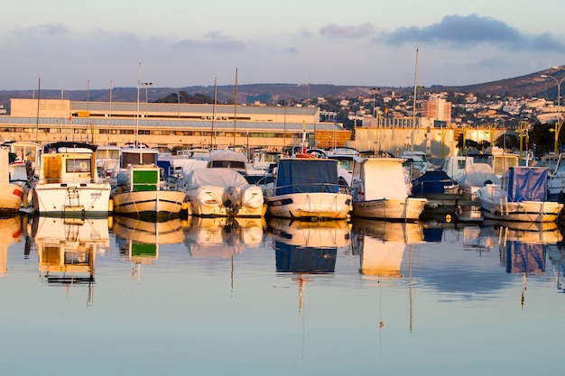 Boats moored in harbour near denia, spain