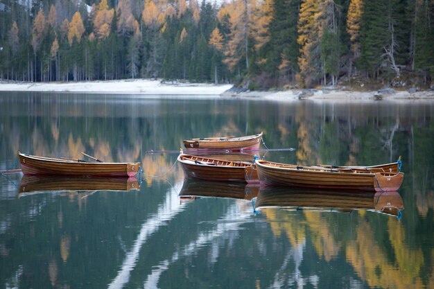 Boats moored in lake