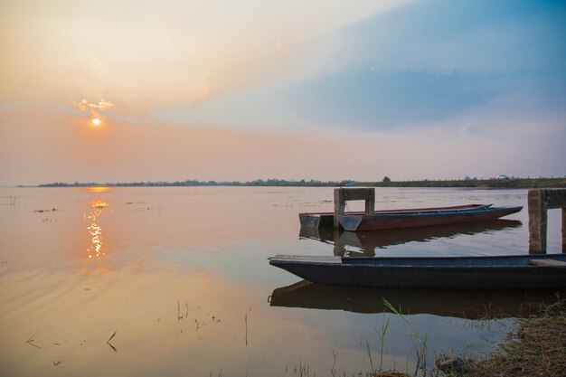 Boats moored in the lake.