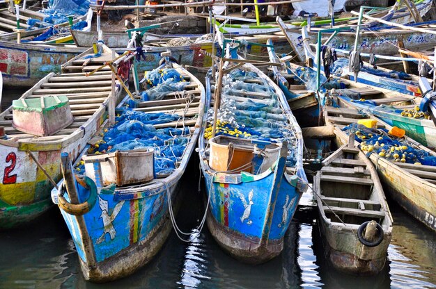 Boats moored in river