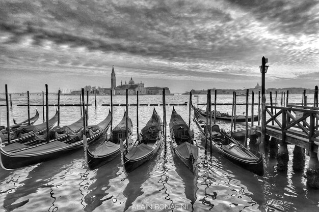 Boats moored in sea