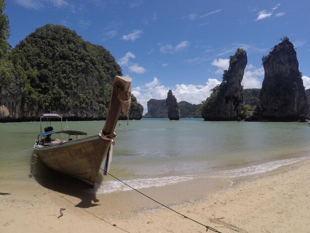 Boats moored in sea