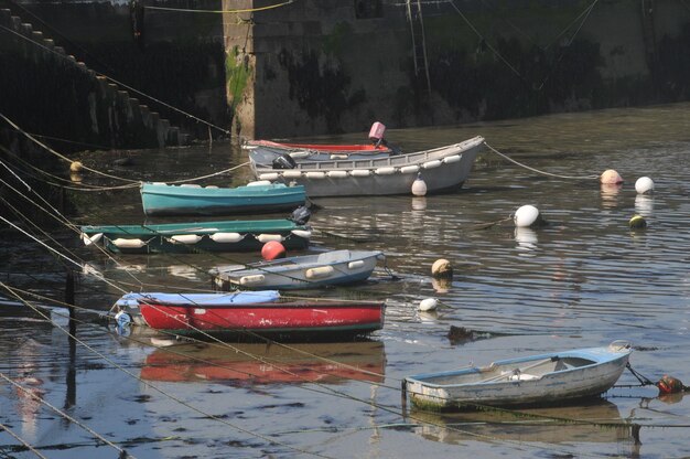 Boats moored in sea