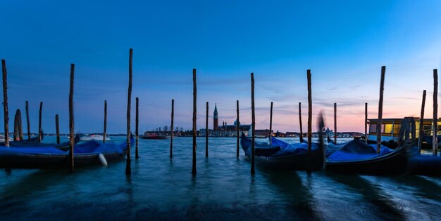 Boats moored in sea