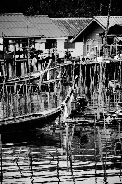 Boats moored in water