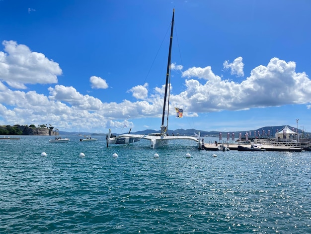 Boats in sea against sky