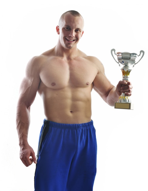 Body builder champion posing in studio