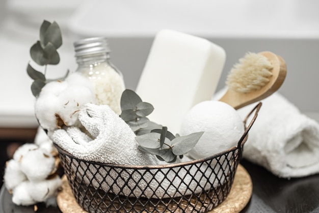 Body care products in a metal basket. Health and hygiene concept.