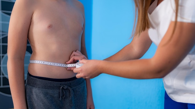 Body fat analysis of children anthropometric belly circumference tape measurement