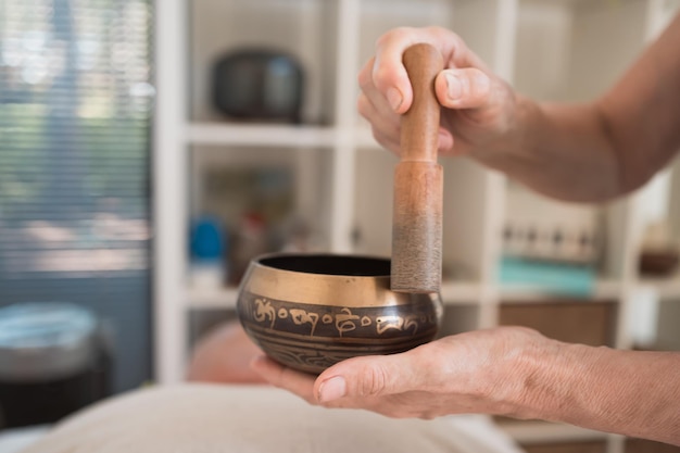 Body healing with sounds of tibetan bowl indoor