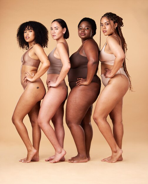 Photo body positivity skin and portrait of women group together for inclusion beauty and power aesthetic model friends on beige background with underwear cellulite pride and motivation for self love