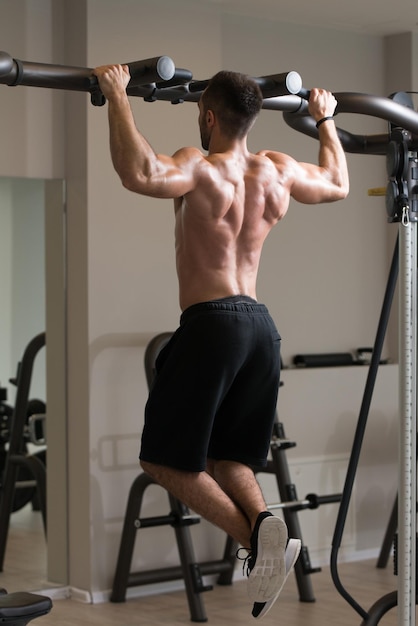 Bodybuilder Doing Pull Ups Best Back Exercises