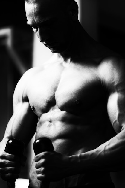 Bodybuilder Exercising Biceps