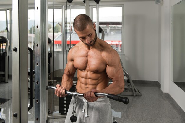 Bodybuilder Exercising Biceps