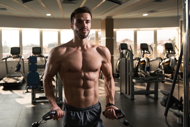 Bodybuilder Exercising Chest On Machine