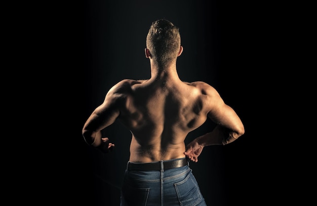 Bodybuilder man with muscular torso back