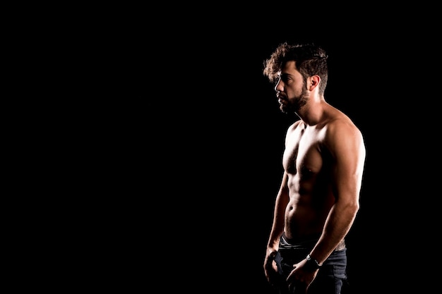 Bodybuilder Posing, Sporty Guy Male Power, Fitness Muscled Man, Spot Concept Copy Space, Dark Background