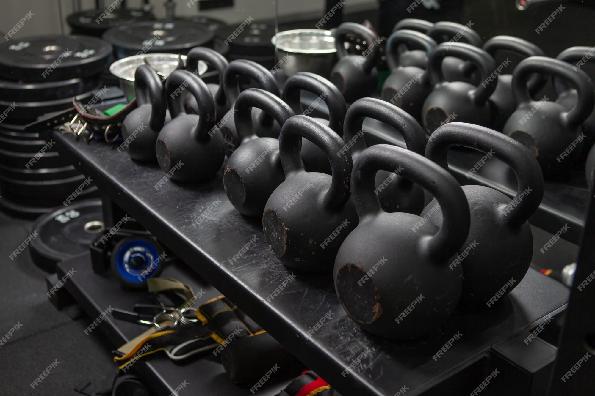 https://img.freepik.com/premium-photo/bodybuilding-free-weight-equipment-rack-with-kettlebells-fitness-accessories-modern-gym-functional-training_175682-22968.jpg?w=2000