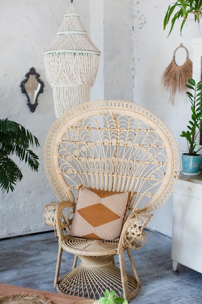 Bohemian interior with peacock armchair