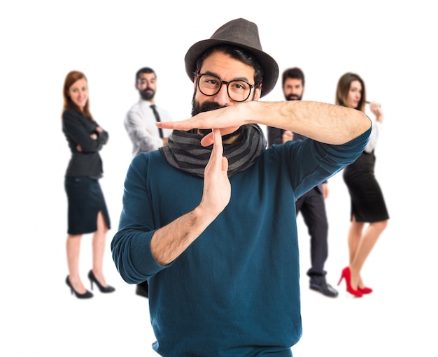 bohemian man making time out gesture  