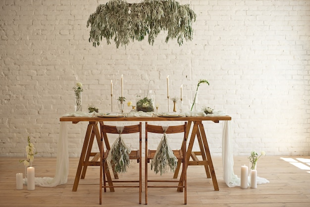 Boho wedding table setting, rustic decorations, gold and blue details, wooden table.luxury wedding decor.