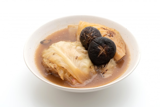 boiled cabbage in red soup with mushroom