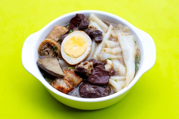 Boiled chinese pasta square with pork soup