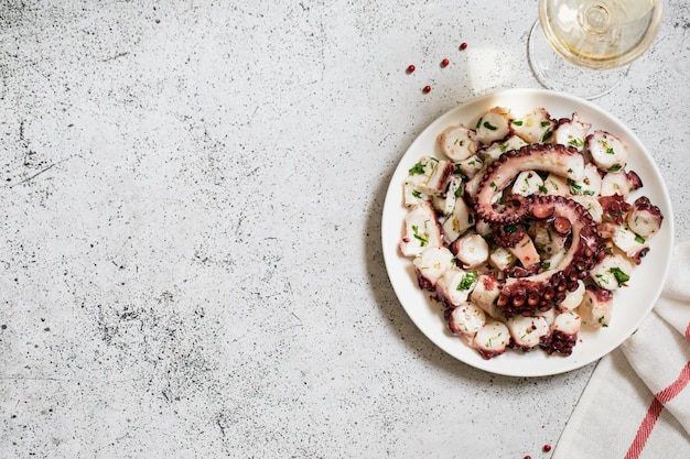 boiled chopped octopus on a concrete table