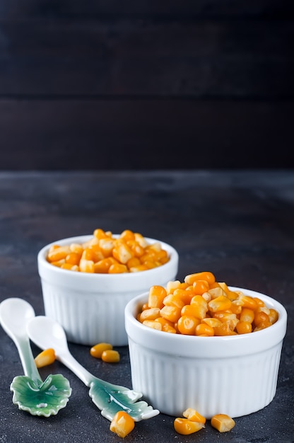 Boiled corn kernels in white cups