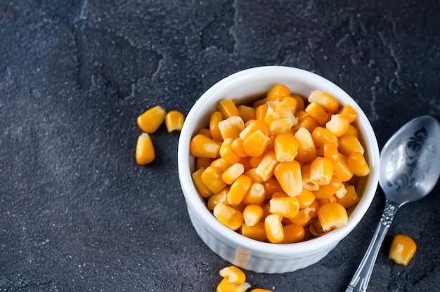 Boiled corn kernels in white cups