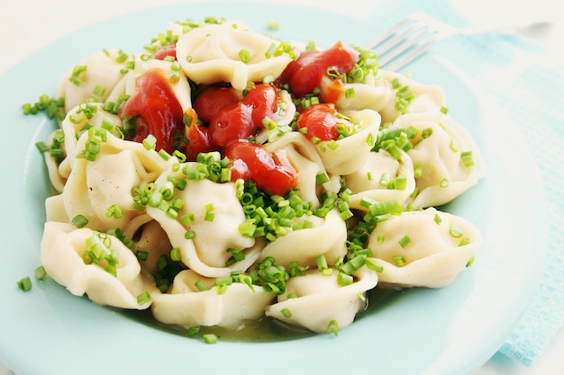 Boiled dumplings with onion