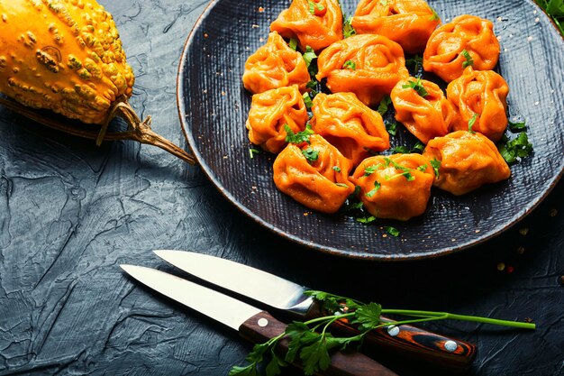 Boiled dumplings with pumpkin.