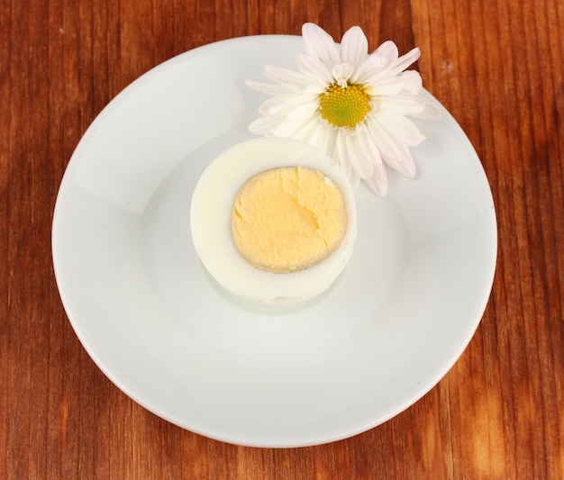 Boiled egg on color background