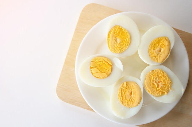 Boiled eggs sliced on dish